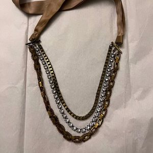Three strand metal and ribbon necklace